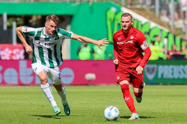 Niko Koulis (SC Preussen Muenster) und Marlon Ritter (1. FC Kaiserslautern) kaempfen um den Ball, 2. Bundesliga, Preußen Münster vs 1. FC Kaiserslautern, Preußenstadion am 24. August 2024 in Münster, Deutschland. (Foto von Marco Steinbrenner DeFodi Images) Niko Koulis (SC Preussen Muenster) und Marlon Ritter (1. FC Kaiserslautern) battle for the ball, 2. Bundesliga, Preußen Münster vs 1. FC Kaiserslautern, Preußenstadion, August 24, 2024 in Münster, Germany. (Photo by Marco Steinbrenner DeFodi Images) DFB DFL REGULATIONS PROHIBIT ANY USE OF PHOTOGRAPHS AS IMAGE SEQUENCES AND OR QUASI-VIDEO. Defodi-700_scp_fcK_20240824_080