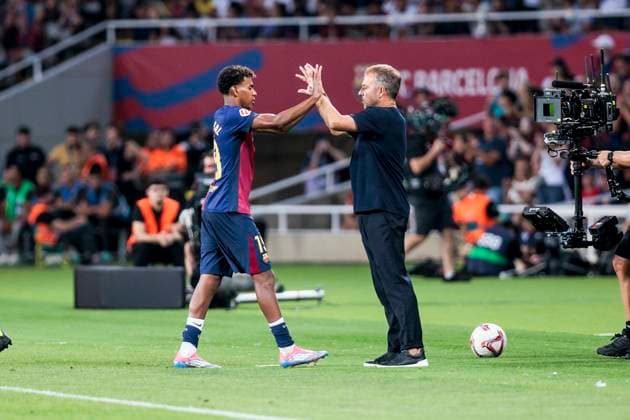 August 24, 2024, Barcelona, Barcelona, SPAIN: Lamine Yamal of FC Barcelona, Barca is congratulated by Hansi Flick, head coach of FC Barcelona during the Spanish league, La Liga EA Sports, football match played between FC Barcelona and Athletic Club de Bilbao at Estadio Olimpico de Montjuic on August 24, 2024 in Barcelona, Spain. Barcelona SPAIN - ZUMAa181 20240824_zaa_a181_080 Copyright: xJavierxBorregoxRamosx
