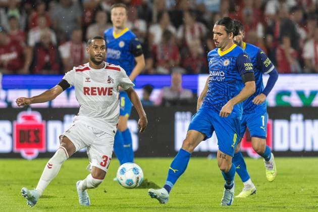 Fußball 2. Liga 1. FC Köln - Eintracht Braunschweig am 24.08.2024 im RheinEnergieStadion in Köln Linton Maina ( Köln ), links - Rayan Philippe ( Braunschweig ), rechts DFB regulations prohibit any use of photographs as image sequences and or quasi-video.