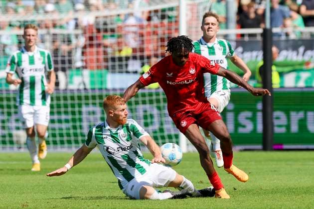 Mikkel Kirkeskov (SC Preussen Muenster) und Dickson Abiama (1. FC Kaiserslautern) kaempfen um den Ball, 2. Bundesliga, Preußen Münster vs 1. FC Kaiserslautern, Preußenstadion am 24. August 2024 in Münster, Deutschland. (Foto von Marco Steinbrenner DeFodi Images) Mikkel Kirkeskov (SC Preussen Muenster) und Dickson Abiama (1. FC Kaiserslautern) battle for the ball, 2. Bundesliga, Preußen Münster vs 1. FC Kaiserslautern, Preußenstadion, August 24, 2024 in Münster, Germany. (Photo by Marco Steinbrenner DeFodi Images) DFB DFL REGULATIONS PROHIBIT ANY USE OF PHOTOGRAPHS AS IMAGE SEQUENCES AND OR QUASI-VIDEO. Defodi-700_scp_fcK_20240824_125