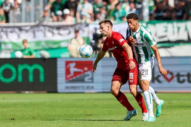 Daniel Hanslik (1. FC Kaiserslautern) und Andras Nemeth (SC Preussen Muenster) kaempfen um den Ball, 2. Bundesliga, Preußen Münster vs 1. FC Kaiserslautern, Preußenstadion am 24. August 2024 in Münster, Deutschland. (Foto von Marco Steinbrenner DeFodi Images) Daniel Hanslik (1. FC Kaiserslautern) und Andras Nemeth (SC Preussen Muenster) battle for the ball, 2. Bundesliga, Preußen Münster vs 1. FC Kaiserslautern, Preußenstadion, August 24, 2024 in Münster, Germany. (Photo by Marco Steinbrenner DeFodi Images) DFB DFL REGULATIONS PROHIBIT ANY USE OF PHOTOGRAPHS AS IMAGE SEQUENCES AND OR QUASI-VIDEO. Defodi-700_scp_fcK_20240824_190