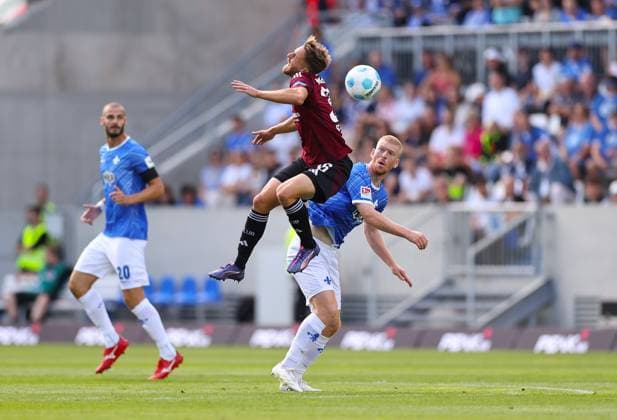 25.08.2024, xdcx, Fussball 2. Bundesliga, SV Darmstadt 98 - 1. FC Nürnberg, emonline, emspor, despor, v.l., Lukas Schleimer (1. FC Nürnberg), Kai Klefisch (SV Darmstadt 98) DFL DFB REGULATIONS PROHIBIT ANY USE OF PHOTOGRAPHS AS IMAGE SEQUENCES AND OR QUASI-VIDEO.