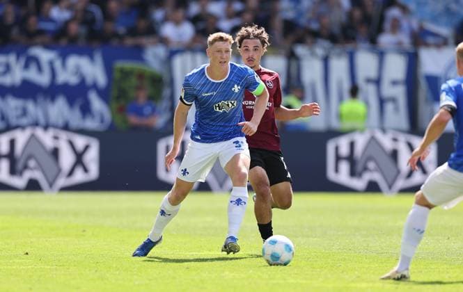 25.08.2024, xdcx, Fussball 2. Bundesliga, SV Darmstadt 98 - 1. FC Nürnberg, emonline, emspor, despor, v.l., Clemens Riedel (SV Darmstadt 98), Rafael Lubach (1. FC Nürnberg) DFL DFB REGULATIONS PROHIBIT ANY USE OF PHOTOGRAPHS AS IMAGE SEQUENCES AND OR QUASI-VIDEO.