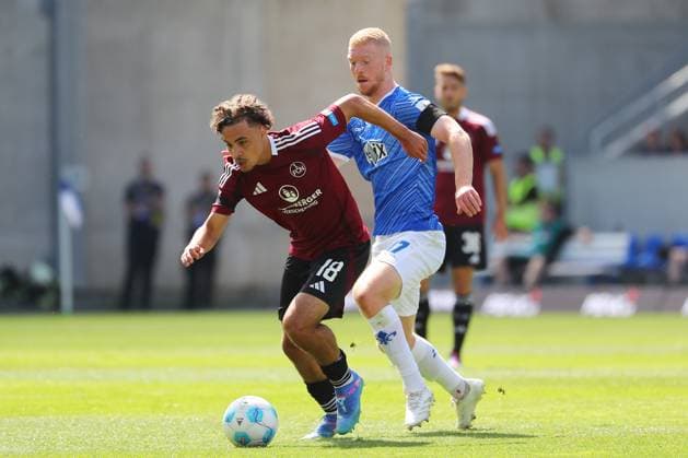 25.08.2024, xtvx, Fussball 2.Bundesliga, SV Darmstadt 98 - 1.FC Nürnberg emspor, v.l. Zweikampf, Duell, duel, tackle, compete Rafael Lubach (1. FC Nuernberg) Isac Lidberg (SV Darmstadt 98) (DFL DFB REGULATIONS PROHIBIT ANY USE OF PHOTOGRAPHS as IMAGE SEQUENCES and or QUASI-VIDEO) Darmstadt