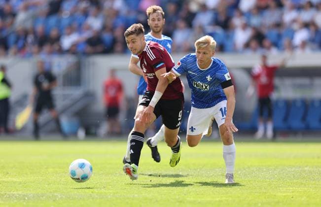 25.08.2024, xdcx, Fussball 2. Bundesliga, SV Darmstadt 98 - 1. FC Nürnberg, emonline, emspor, despor, v.l., Stefanos Tzimas (1. FC Nürnberg), Andreas Müller (SV Darmstadt 98) DFL DFB REGULATIONS PROHIBIT ANY USE OF PHOTOGRAPHS AS IMAGE SEQUENCES AND OR QUASI-VIDEO.