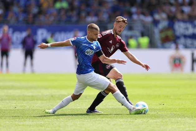 25.08.2024, xdcx, Fussball 2. Bundesliga, SV Darmstadt 98 - 1. FC Nürnberg, emonline, emspor, despor, v.l., Fabian Nürnberger (SV Darmstadt 98), Lukas Schleimer (1. FC Nürnberg) DFL DFB REGULATIONS PROHIBIT ANY USE OF PHOTOGRAPHS AS IMAGE SEQUENCES AND OR QUASI-VIDEO.