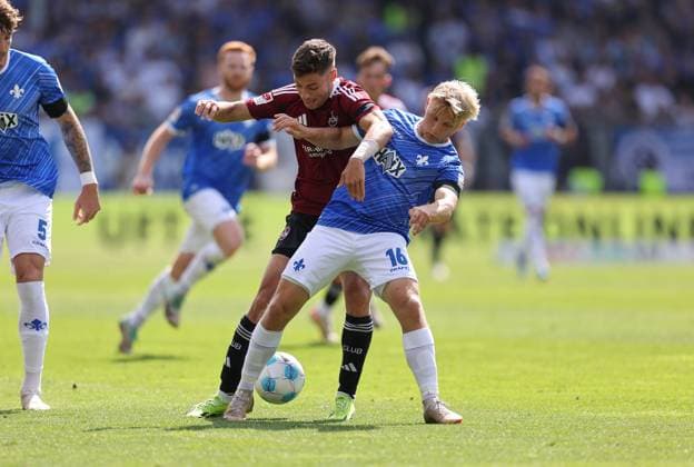 25.08.2024, xdcx, Fussball 2. Bundesliga, SV Darmstadt 98 - 1. FC Nürnberg, emonline, emspor, despor, v.l., Stefanos Tzimas (1. FC Nürnberg), Andreas Müller (SV Darmstadt 98) DFL DFB REGULATIONS PROHIBIT ANY USE OF PHOTOGRAPHS AS IMAGE SEQUENCES AND OR QUASI-VIDEO.