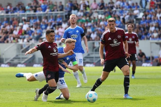 25.08.2024, xtvx, Fussball 2.Bundesliga, SV Darmstadt 98 - 1.FC Nürnberg emspor, v.l. Zweikampf, Duell, duel, tackle, compete Clemens Riedel (SV Darmstadt 98) Danillo Soares (1. FC Nuernberg) (DFL DFB REGULATIONS PROHIBIT ANY USE OF PHOTOGRAPHS as IMAGE SEQUENCES and or QUASI-VIDEO) Darmstadt
