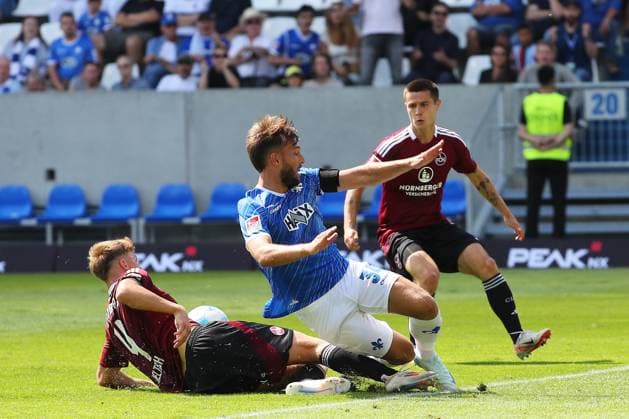25.08.2024, xtvx, Fussball 2.Bundesliga, SV Darmstadt 98 - 1.FC Nürnberg emspor, v.l. Zweikampf, Duell, duel, tackle, compete Killian Corredor (SV Darmstadt 98) Finn Jeltsch (1. FC Nuernberg) (DFL DFB REGULATIONS PROHIBIT ANY USE OF PHOTOGRAPHS as IMAGE SEQUENCES and or QUASI-VIDEO) Darmstadt