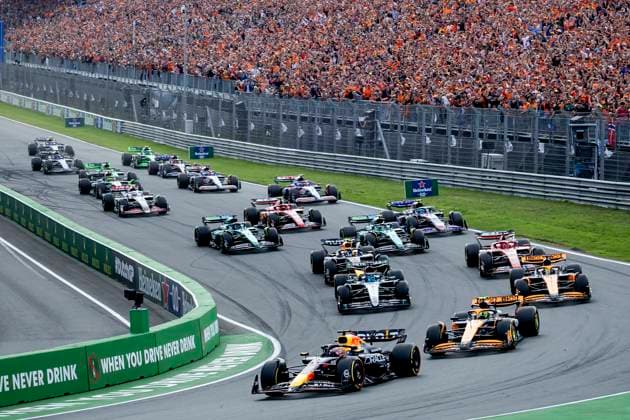 ZANDVOORT - Max Verstappen (Red Bull Racing) in the lead at the start, with Lando Norris (McLaren) behind him during the F1 Grand Prix of the Netherlands at the Circuit of Zandvoort. ANP SEM VAN DER WAL xVIxANPxSportx xxANPxIVx 506720958 originalFilename: 506720958.jpg