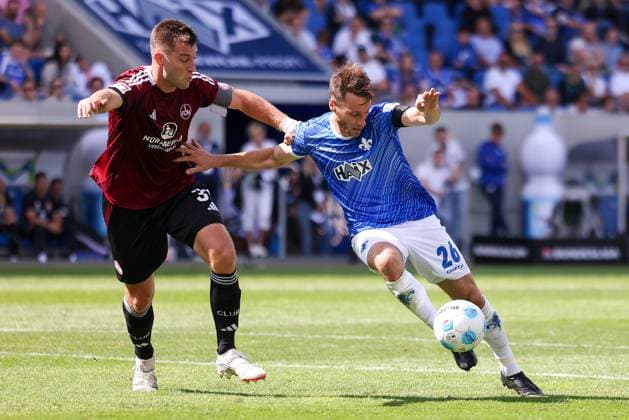 2024.08.25 xJFAx Fussball 2.Bundesliga 3.Spieltag Saison 2024 25, SV Darmstadt 98 - 1.FC Nürnberg v.l., Robin Knoche (1.FC Nürnberg), Matthias Bader (SV Darmstadt 98), Zweikampf, Action, Aktion, Battles for the Ball (DFL DFB REGULATIONS PROHIBIT ANY USE OF PHOTOGRAPHS as IMAGE SEQUENCES and or QUASI-VIDEO