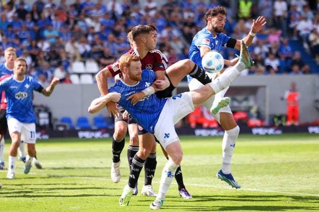 2024.08.25 xJFAx Fussball 2.Bundesliga 3.Spieltag Saison 2024 25, SV Darmstadt 98 - 1.FC Nürnberg v.l., Stefanos Tzimas (1.FC Nürnberg), Paul Will (SV Darmstadt 98), Zweikampf, Action, Aktion, Battles for the Ball (DFL DFB REGULATIONS PROHIBIT ANY USE OF PHOTOGRAPHS as IMAGE SEQUENCES and or QUASI-VIDEO