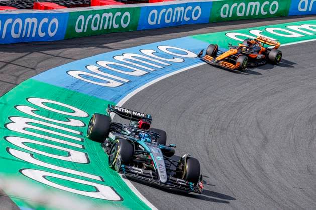 George Russell of Great Britain and Mercedes-AMG Petronas F1 Team and Oscar Piastri of Australia and McLaren Formula 1 Team during the F1 Grand Prix of Netherlands at Circuit Park Zandvoort on August 25, 2024 in Zandvoort, Netherlands. Defodi-704_MTB20240825F1MTBPhoto-7868