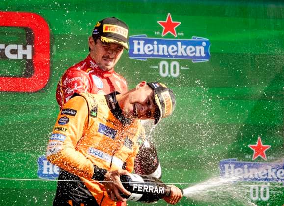ZANDVOORT - Charles Leclerc (Ferrari) and Lando Norris (McLaren) on the podium after the F1 Grand Prix of the Netherlands at the Circuit of Zandvoort. ANP SEM VAN DER WAL xVIxANPxSportx xxANPxIVx 506727906 originalFilename: 506727906.jpg