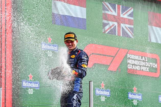 25th August 2024; Circuit Zandvoort, Zandvoort, North Holland, Netherlands; Formula 1 Heineken Dutch Grand Prix 2024; Race Day; Max Verstappen (NED) sprays champagne over the crowd from the podium  ActionPlus12686040 GodfreyxPitt