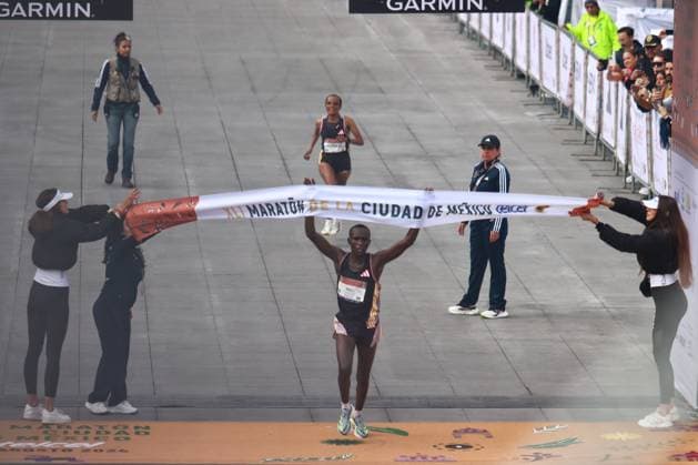 August 25, 2024, Mexico City, Ciudad de Mexico, Mexico: Fancy Chemutai of Kenya crossing the finish line in womenÃ¢â‚¬â ¢s first place of the XLI Mexico City Marathon 2024 posing with her medal. on August 25, 2024 in Mexico City, Mexico. Mexico City Mexico - ZUMAe321 20240825_zsa_e321_014 Copyright: xCarlosxSantiago xEyepixxGroupx