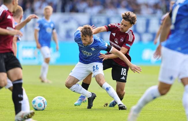 25.08.2024, xdcx, Fussball 2. Bundesliga, SV Darmstadt 98 - 1. FC Nürnberg, emonline, emspor, despor, v.l., Matthias Bader (SV Darmstadt 98), Rafael Lubach (1. FC Nürnberg) DFL DFB REGULATIONS PROHIBIT ANY USE OF PHOTOGRAPHS AS IMAGE SEQUENCES AND OR QUASI-VIDEO.