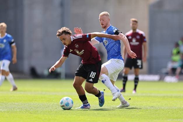25.08.2024, xdcx, Fussball 2. Bundesliga, SV Darmstadt 98 - 1. FC Nürnberg, emonline, emspor, despor, v.l., Rafael Lubach (1. FC Nürnberg), Kai Klefisch (SV Darmstadt 98) DFL DFB REGULATIONS PROHIBIT ANY USE OF PHOTOGRAPHS AS IMAGE SEQUENCES AND OR QUASI-VIDEO.