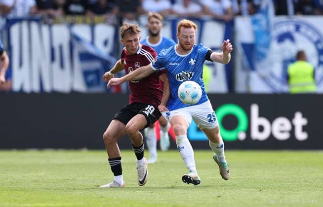 25.08.2024, xdcx, Fussball 2. Bundesliga, SV Darmstadt 98 - 1. FC Nürnberg, emonline, emspor, despor, v.l., Michal Sevcik (1. FC Nürnberg), Paul Will (SV Darmstadt 98) DFL DFB REGULATIONS PROHIBIT ANY USE OF PHOTOGRAPHS AS IMAGE SEQUENCES AND OR QUASI-VIDEO.