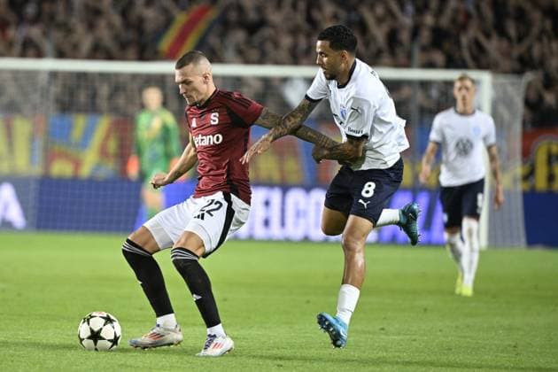 From left Lukas Haraslin of Sparta and Sergio Pena of Malmo in action during the Football Champions League 4th qualifying round Return match: Sparta Prague vs Malmo FF in Prague, Czech Republic, August 27, 2024. (CTKxPhoto KaterinaxSulova) CTKPhotoP2024082707176  CTKPhotoP2024082707176