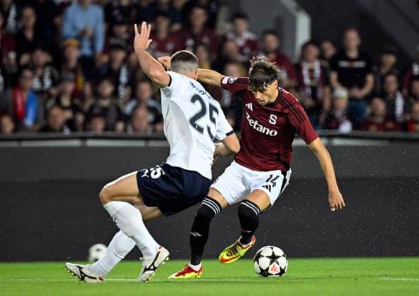 From left Gabriel Busanello of Malmo and Veljko Birmancevic of Sparta during the Football Champions League 4th qualifying round Return match: Sparta Prague vs Malmo FF in Prague, Czech Republic, August 27, 2024. (CTKxPhoto KaterinaxSulova) CTKPhotoP2024082707371  CTKPhotoP2024082707371