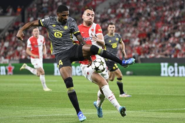 L-R Alexsandro (Lille) and Tomas Chory (Slavia) in action during the UEFA Champions League, 4th qualifying round, return match SK Slavia Praha (Czechia) vs Lille OSC (France), in Prague, Czech Republic, on August 28, 2024. (CTKxPhoto MichalxKamaryt) CTKPhotoP2024082807779  CTKPhotoP2024082807779