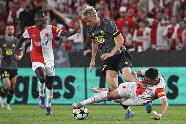 L-R Oscar (Slavia), Hakon Arnar Haraldsson (Lille) and Christos Zafeiris (Slavia) in action during the UEFA Champions League, 4th qualifying round, return match SK Slavia Praha (Czechia) vs Lille OSC (France), in Prague, Czech Republic, on August 28, 2024. (CTKxPhoto MichalxKamaryt) CTKPhotoP2024082808077  CTKPhotoP2024082808077