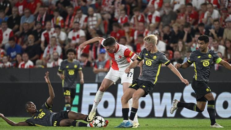 L-R Bafode Diakite (Lille), Lukas Provod (Slavia), Hakon Arnar Haraldsson (Lille) and Benjamin Andre (Lille) in action during the UEFA Champions League, 4th qualifying round, return match SK Slavia Praha (Czechia) vs Lille OSC (France), in Prague, Czech Republic, on August 28, 2024. (CTKxPhoto MichalxKamaryt) CTKPhotoP2024082808099  CTKPhotoP2024082808099