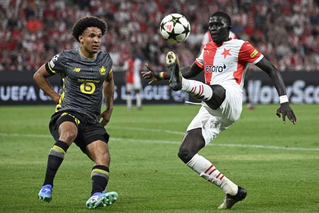 L-R Tiago Santos (Lille) and El Hadji Malick Diouf (Slavia) in action during the UEFA Champions League, 4th qualifying round, return match SK Slavia Praha (Czechia) vs Lille OSC (France), in Prague, Czech Republic, on August 28, 2024. (CTKxPhoto MichalxKamaryt) CTKPhotoP2024082808425  CTKPhotoP2024082808425