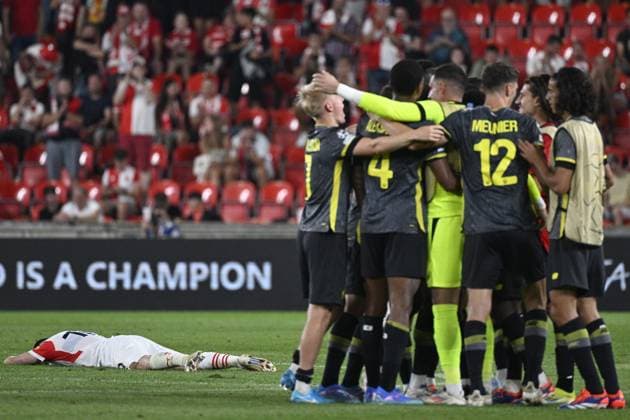Christos Zafeiris (Slavia; left) is seen after the UEFA Champions League, 4th qualifying round, return match SK Slavia Praha (Czechia) vs Lille OSC (France), in Prague, Czech Republic, on August 28, 2024. Slavia won 2:1, but could not erase the 0:2 loss from the opening match. On the right, Lille players celebrate progressing to the main stage of the Champions League. (CTKxPhoto MichalxKamaryt) CTKPhotoP2024082808627  CTKPhotoP2024082808627
