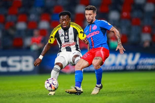 SOCCER - UEFA EL, Bucharest vs LASK BUCHAREST,ROMANIA,29.AUG.24 - SOCCER - UEFA Europa League, qualification, FCSB Bucharest vs Linzer ASK. Image shows George Bello (LASK) and Alexandru Baluta (Bukarest).  GEPAxpictures xManuelxBinder