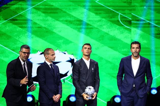 29th of August 2024 - UEFA CHAMPIONS LEAGUE KICK OFF 2024 2025 - DRAW LOTTERY WITH AI - FORUM GRIMALDI ronaldo (cristiano) receives a trophy by the UEFA president ceferin (aleksander) on the sight of buffon (gianluigi) and pinto (pedro) MONACO MONACO Copyright: xSPORTPIXPRESSx xFREDxPORCUx