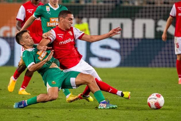 SOCCER - UEFA EL, Rapid vs Braga VIENNA,AUSTRIA,29.AUG.24 - SOCCER - UEFA Europa League, qualification, SK Rapid Wien vs Sporting Club de Braga. Image shows Jonas Auer (Rapid) and Amine El Ouazzani (Braga).  GEPAxpictures xPhilippxBrem