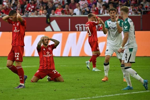 Duesseldorf, Merkusr-Spielarena, 30.08.24, GER, Herren, 2.Bundesliga, Saison 2024-2025, Fortuna Duesseldorf - Hannover 96 Bild: v.li. Danny SCHMIDT (Duesseldorf) und Matthias ZIMMERMANN (Duesseldorf) Only for editorial use! DFL regulations prohibit any use of photographs as image sequences and or quasi-video. NRW Deutschland