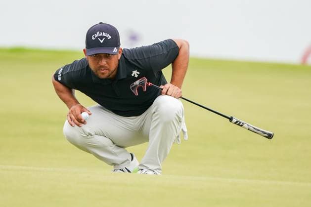 August 31, 2024, Atlanta, Georgia, USA: Xander Schauffele lines up a putt on the 18th green during the third round at the 2024 TOUR Championship at East Lake Golf Club. Atlanta USA - ZUMAw109 20240831_fap_w109_037 Copyright: xDebbyxWongx