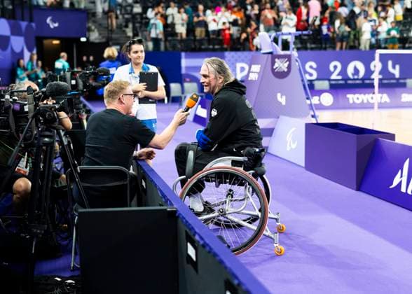 PARIS, FRANCE - SEPTEMBER 01: Thomas WANDSCHNEIDER (GER), startclass WH1 reacts during the para badminton match at the men™s singles WH1 Semifinal of the Paris 2024 Summer Paralympic Games at Porte de la Chapelle Arena on September 01, 2024 in Paris, France. (Photo by Mika Volkmann)