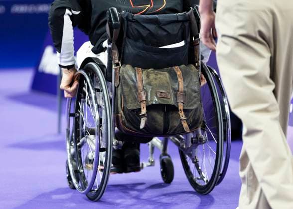 PARIS, FRANCE - SEPTEMBER 02: Thomas WANDSCHNEIDER (GER), startclass WH1 wins the bronce medal and celebrates during the winning ceremony Paris 2024 Summer Paralympic Games at Porte de la Chapelle Arena on September 02, 2024 in Paris, France. (Photo by Mika Volkmann DBS)