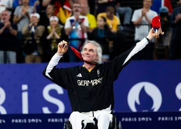 PARIS, FRANCE - SEPTEMBER 02: Thomas WANDSCHNEIDER (GER), startclass WH1 wins the bronce medal and celebrates during the winning ceremony Paris 2024 Summer Paralympic Games at Porte de la Chapelle Arena on September 02, 2024 in Paris, France. (Photo by Mika Volkmann DBS)