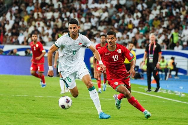 September 5, 2024, Basra, Iraq: Iraq s Zaid Tahseen (L) with Oman s Mohammed Mubarak (R) seen in action during the 2026 FIFA World Cup, WM, Weltmeisterschaft, Fussball AFC qualifiers football match between Iraq and Oman at Basra International Stadium. Iraq won 1-0 Oman Basra Iraq - ZUMAs197 20240905_aaa_s197_450 Copyright: xIsmaelxAdnanx
