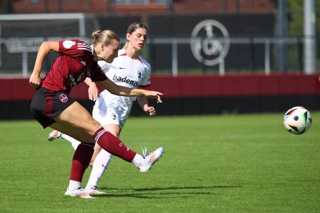 07.09.2024 - Fussball - Saison 2024 2025 - DFB-Pokal Frauen : 1. FC Nürnberg FCN ( Club Clubfrauen ) - SC Freiburg - Sportfoto Zink - xdcxdex - Amelie Thöle Thoele (12, 1. FC Nürnberg FCN ), Eileen Michelle Campbell ( 10 , SC Freiburg )