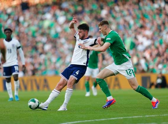 7th September 2024; Aviva Stadium, Dublin, Ireland; Nations League, League B, Group 2 International Football, Republic of Ireland versus England; Declan Rice of England is challenged by Jake O Brien of Ireland  ActionPlus12690477 PeterxFitzpatrick