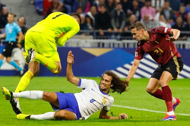 France v Belgium - UEFA Nations League LYON, FRANCE - SEPTEMBER 09 : Castagne Timothy defender of Belgium, Casteels Koen goalkeeper of Belgium and Guendouzi Matteo midfielder of France during the UEFA Nations League match in group A2 between France and Belgium on September 9, 2024 in Lyon, France, 09 09 2024 Lyon France  Copyright: xJanxDexMeuleneirx