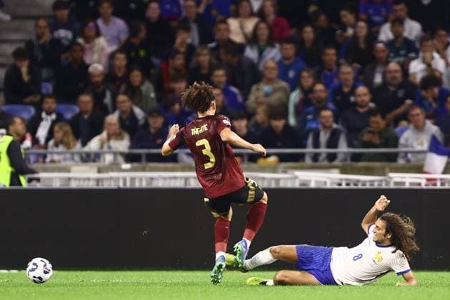 France v Belgium - UEFA Nations League LYON, FRANCE - SEPTEMBER 09 : Guendouzi Matteo midfielder of France battles for possession with Theate Arthur defender of Belgium during the UEFA Nations League match in group A2 between France and Belgium on September 9, 2024 in Lyon, France, 09 09 2024 Lyon France  Copyright: xTomasxSiskx