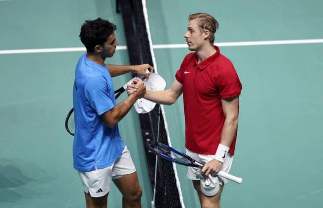 Denis Shapovalov of Canada shakes hands with Francisco Cerundolo of Argentina Davis Cup Group Stage Finals 2024, Day One, AO Arena, Manchester, UK - 10 Sep 2024  Copyright: xEllaxLing Shutterstockx 14707252ac