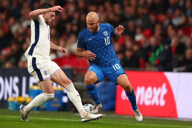 10th September 2024; Wembley Stadium, London, England; Nations League, League B, Group 2 International Football, England versus Finland; Teemu Pukki of Finland takes on Declan Rice of England  ActionPlus12691215 ShaunxBrooks