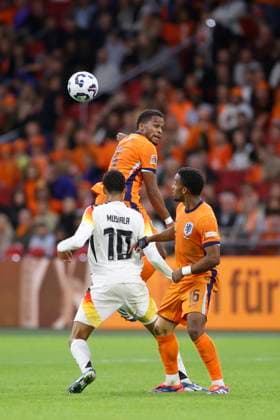 AMSTERDAM, 10-09-2024 , JohanCruyff Arena, Nations League game between Netherlands and Germany. (L-R) Germany player Jamal Musiala, Netherlands player Jurrien Timber, Netherlands player Quinten Timber Netherlands - Germany  x26243240x Copyright: