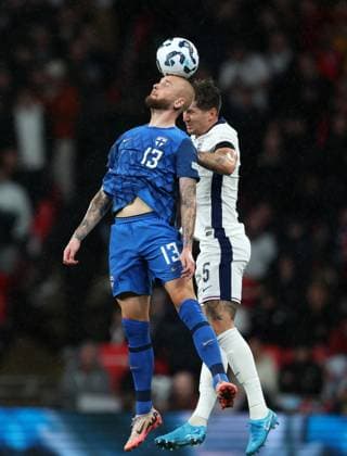 Adam Stahl of Finland with John Stones of England England v Finland - UEFA Nations League - League B - Group 2. Football. Wembey Stadium, London. UK. 10 SEP 2024 Editorial use only  Copyright: xJASONPIX Shutterstockx 14710299ft