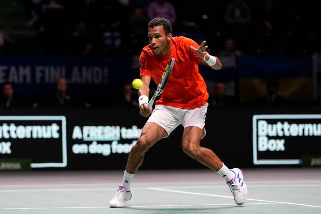 12th September 2024; AO Arena, Manchester, England; Davis Cup Finals, Group Stage, Group D Day 3; Felix Auger-Aliassime of Canada plays a backhand shot  ActionPlus12691637 StevenxFlynn