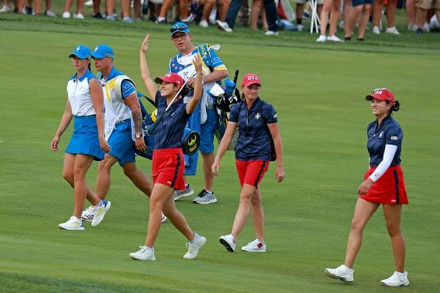 GAINESVILLE, VA - SEPTEMBER 13: USA golfer Andrea Lee encourages the crowd to cheer louder on the 14th hole during the Friday Four-Ball of the first round of the 2024 Solheim Cup on September 13, 2024, at Robert Trent Jones Golf Club at Gainesville, Virginia. (Photo by Brian Spurlock Icon Sportswire) GOLF: SEP 13 Solheim Cup EDITORIAL USE ONLY Icon24091389