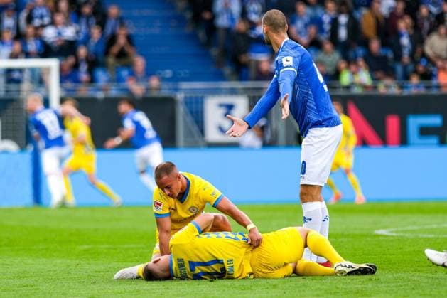 Sven Koehler (Eintracht Braunschweig, 27) verletzt am Boden, GER, SV Darmstadt 98 vs. Eintracht Braunschweig, Fussball, 2. Bundesliga, 5. Spieltag, Spielzeit 2024 2025, 14.09.2024. DFL DFB REGULATIONS PROHIBIT ANY USE OF PHOTOGRAPHS as IMAGE SEQUENCES and or QUASI-VIDEO. GER, SV Darmstadt 98 vs. Eintracht Braunschweig, Fussball, 2. Bundesliga, 5. Spieltag, Spielzeit 2024 2025, 14.09.2024. Darmstadt